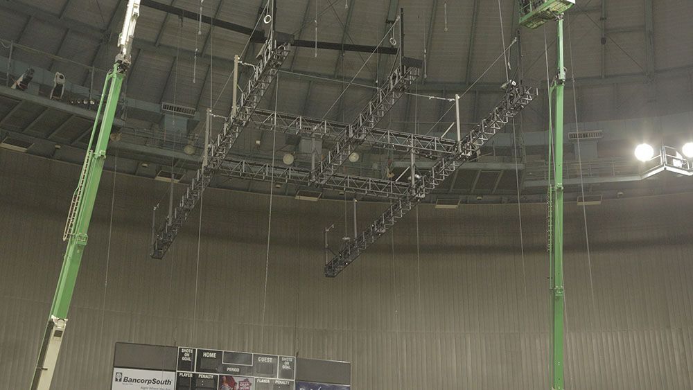 Cranes working on rafters